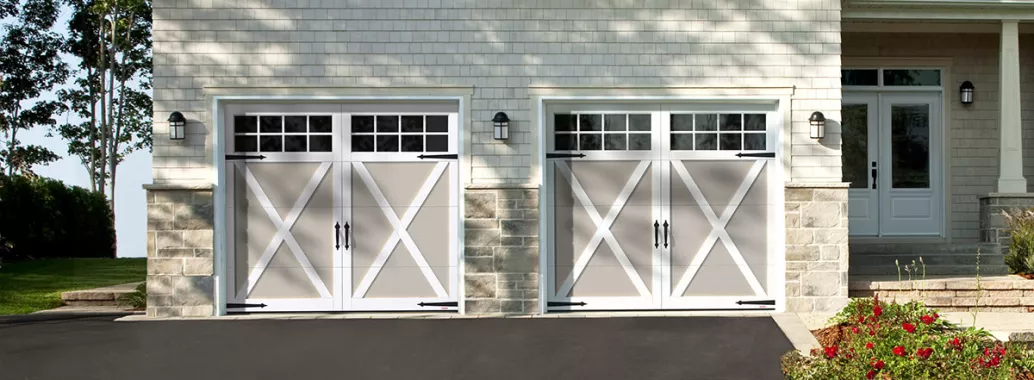 Eastman E-21, 9’ x 7’, Claystone doors and Ice White overlays, 8 lite Panoramic windows